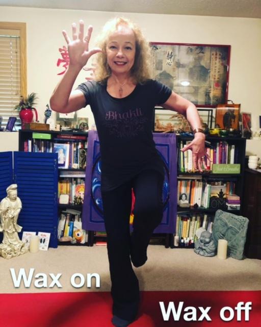 Sandy in a yoga position - wax on wax off